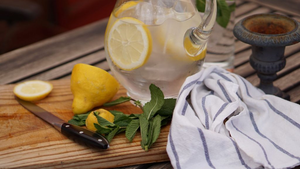 Slices of lemon in water jug