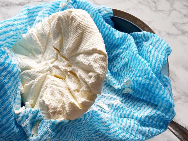 Removing Labneh from Cheesecloth -How to Make Labneh